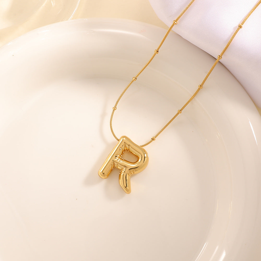 Damenkette mit gebogenem Buchstabenanhänger Tracht Nova