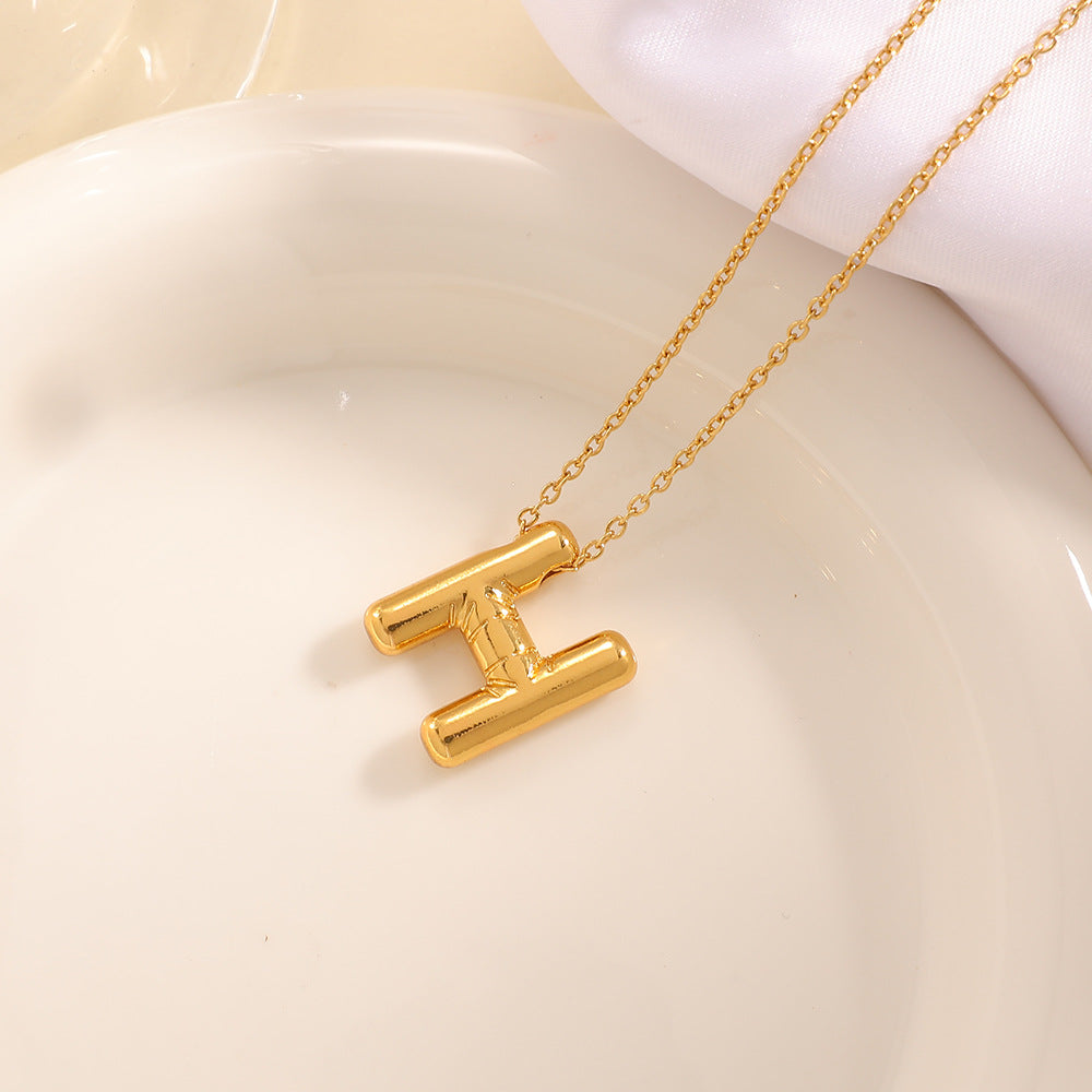 Damenkette mit gebogenem Buchstabenanhänger Tracht Nova